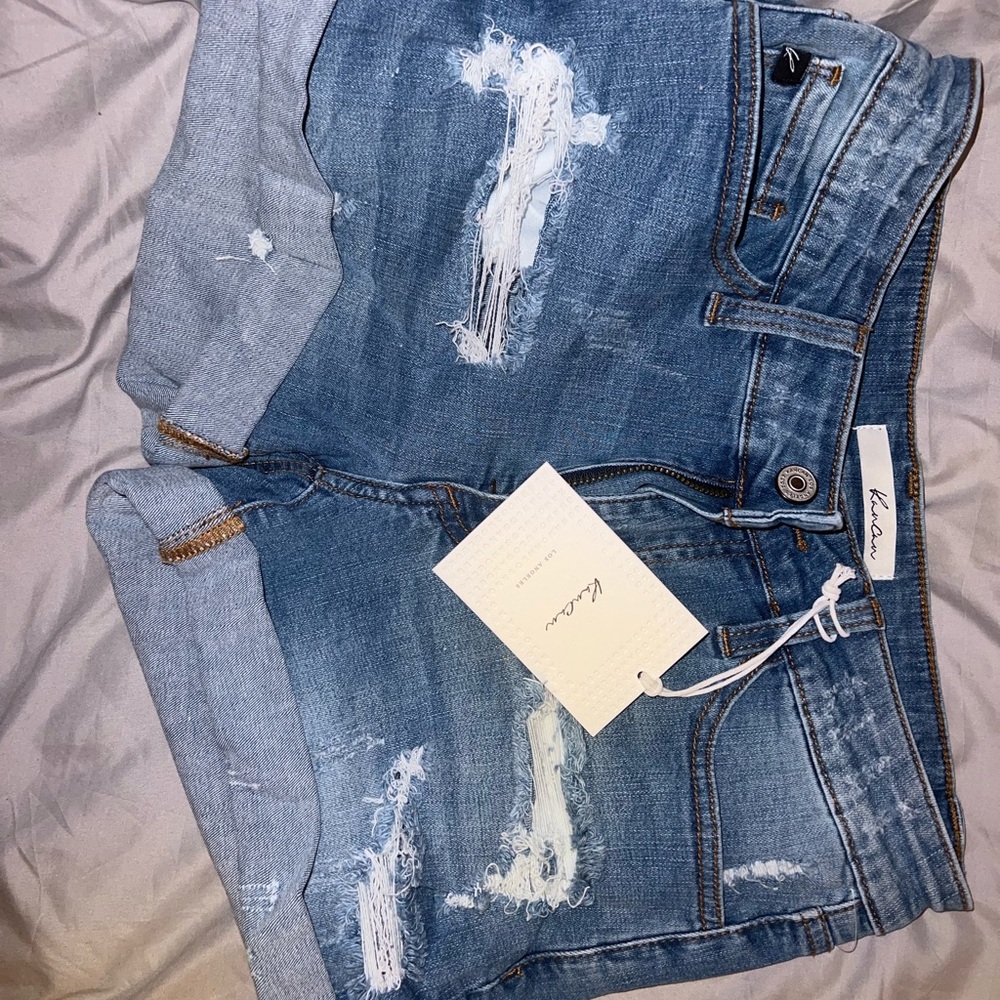 Ripped denim shorts